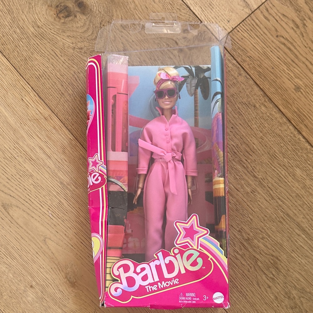 Barbie Pink Jumpsuit Doll with Headwrap and Sunglasses the movie